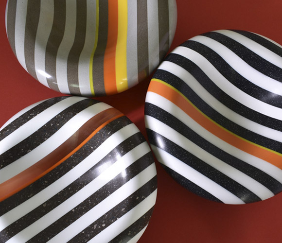 three striped corian bowls